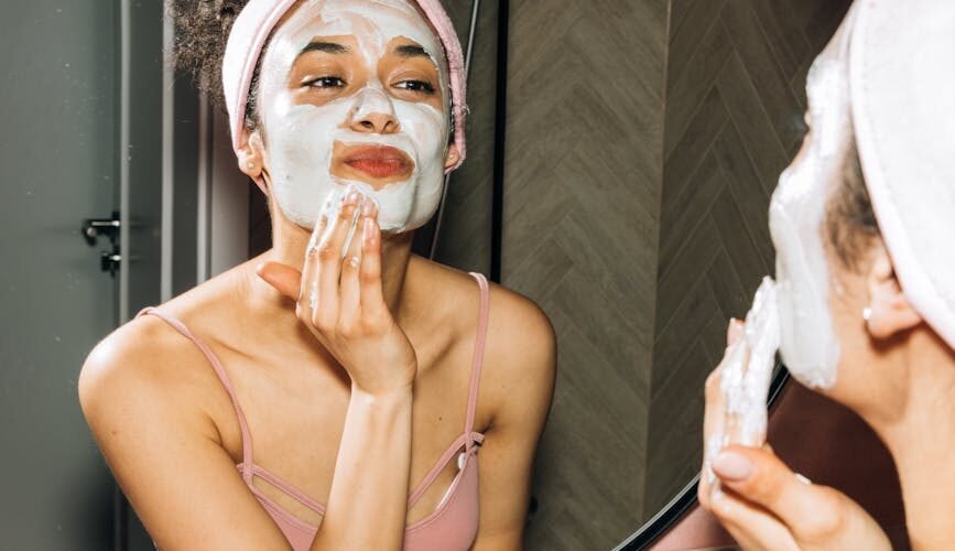 girl doing her facial skin care